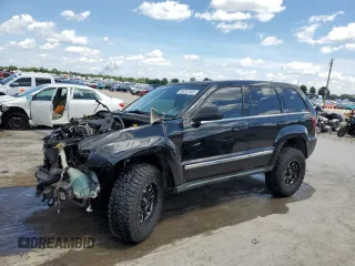 2005 Jeep Grand Cherokee Limited with VIN 1J4HR58N25C548569, listed as a Copart auction lot 63232405 with 160,889 mi miles and Salvage title. Bid and sale history available at DreamBid. Image 1.
