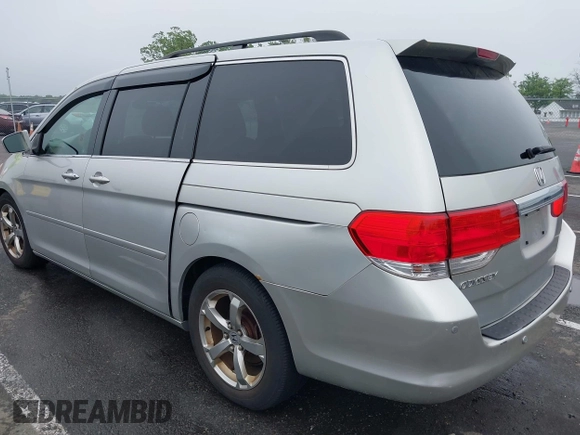 2009 Honda Odyssey Touring with VIN 5FNRL38859B029714, listed as a IAAI auction lot 42266381 with 196,747 mi miles and . Bid and sale history available at DreamBid. Image 3.