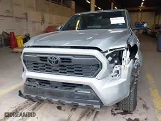 2024 Toyota Tacoma 4WD SR5 with VIN 3TMLB5JN4RM071338, listed as a IAAI auction lot 41742236 with 9,367 mi miles. Bid and sale history available at carsss.com. Image 6.