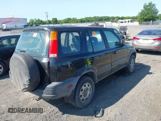 1999 Honda CR-V LX z VIN JHLRD2842XC010409, wystawiony jako IAAI lot #42402281 z przebiegiem 265 901 mil mil oraz . Historia ofert i sprzedaży dostępna na DreamBid. Obrazek 4.