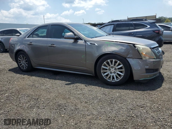 2012 Cadillac CTS Luxury with VIN 1G6DE5E54C0138040, listed as a Copart auction lot 61997305 with 140,996 mi miles and Salvage title. Bid and sale history available at DreamBid. Image 4.