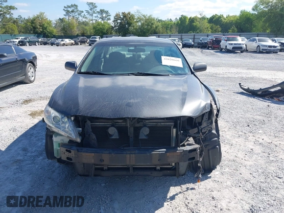 2009 Toyota Camry with VIN 4T1BE46KX9U879566, listed as a IAAI auction lot 42020660 with 207,291 mi miles. Bid and sale history available at carsss.com. Image 13.