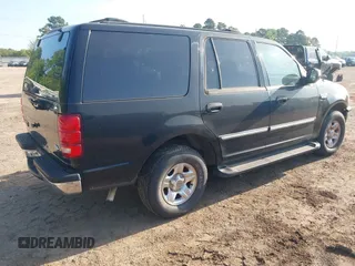 1998 Ford Expedition XLT with VIN 1FMRU1766WLC31063, listed as a IAAI auction lot 41959189 with 168,690 mi miles. Bid and sale history available at carsss.com. Image 4.
