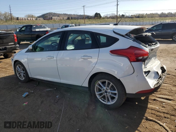2017 Ford Focus SE with VIN 1FADP3K24HL247048, listed as a Copart auction lot 52564945 with 128,762 mi miles and Salvage Title. Bid and sale history available at carsss.com. Image 2.