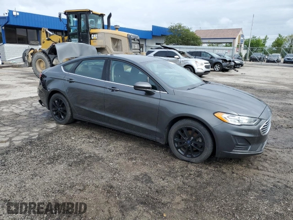 2020 Ford Fusion SE z VIN 3FA6P0HD1LR252332, wystawiony jako Copart lot #58123365 z przebiegiem 76 410 mil mil oraz Szkoda całkowita • Salvage title. Historia ofert i sprzedaży dostępna na DreamBid. Obrazek 4.