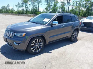 2017 Jeep Grand Cherokee Overland with VIN 1C4RJFCG2HC641791, listed as a IAAI auction lot 42566654 with 116,764 mi miles and . Bid and sale history available at DreamBid. Image 17.