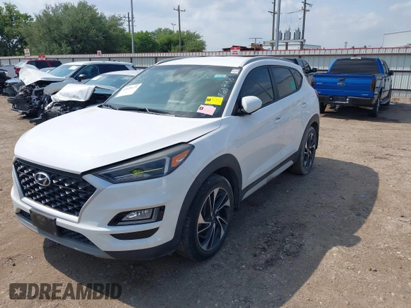 2019 Hyundai Tucson Sport with VIN KM8J33AL1KU861698, listed as a IAAI auction lot 42129173 with 100,160 mi miles. Bid and sale history available at carsss.com. Image 2.