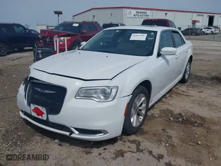 2016 Chrysler 300 Limited with VIN 2C3CCAAG7GH197829, listed as a IAAI auction lot 41853341 with 220,662 mi miles. Bid and sale history available at carsss.com. Image 18.