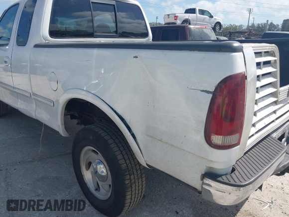 1997 Ford F-150 XL with VIN 1FTDX1868VKA12923, listed as a IAAI auction lot 41526986 with 343,755 mi miles. Bid and sale history available at carsss.com. Image 6.