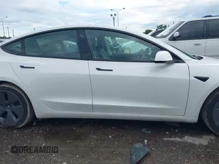 2023 Tesla Model 3 z VIN 5YJ3E1EA0PF511158, wystawiony jako IAAI lot #42210455 z przebiegiem 22 291 mil mil oraz . Historia ofert i sprzedaży dostępna na DreamBid. Obrazek 13.