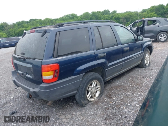 2003 Jeep Grand Cherokee Laredo with VIN 1J4GW48S63C591605, listed as a IAAI auction lot 42389898 with 177,024 mi miles and . Bid and sale history available at DreamBid. Image 4.