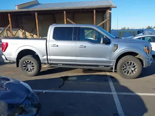 2023 Ford F-150 XL with VIN 1FTEW1E87PFA92353, listed as a IAAI auction lot 41418058 with 13,668 mi miles. Bid and sale history available at carsss.com. Image 13.