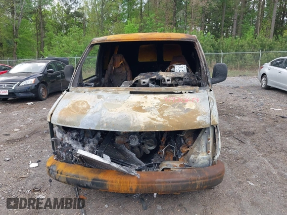 2000 GMC Savana z VIN 1GTEG15W1Y1142853, wystawiony jako IAAI lot #41930619 z przebiegiem Nie podano mil oraz . Historia ofert i sprzedaży dostępna na DreamBid. Obrazek 6.