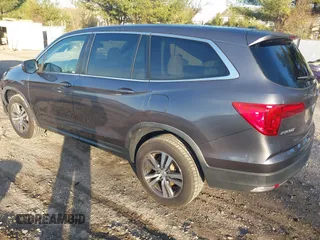 2017 Honda Pilot EX-L z VIN 5FNYF6H70HB069712, wystawiony jako IAAI lot #41828893 z przebiegiem 70 061 mil mil oraz . Historia ofert i sprzedaży dostępna na DreamBid. Obrazek 3.