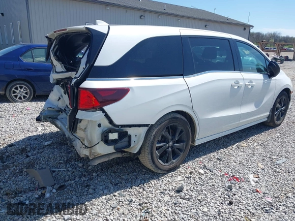 2023 Honda Odyssey Sport z VIN 5FNRL6H73PB022900, wystawiony jako IAAI lot #41977796 z przebiegiem 65 558 mil mil oraz . Historia ofert i sprzedaży dostępna na DreamBid. Obrazek 4.