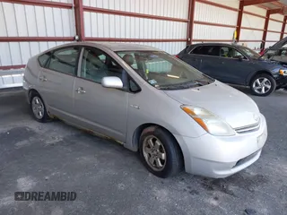 2007 Toyota Prius z VIN JTDKB20U877673119, wystawiony jako IAAI lot #42309688 z przebiegiem 242 831 mil mil oraz . Historia ofert i sprzedaży dostępna na DreamBid. Obrazek 1.