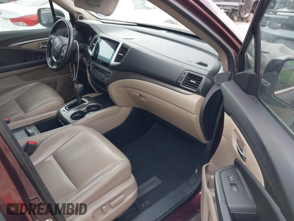 2016 Honda Pilot EX-L with VIN 5FNYF5H58GB026209, listed as a IAAI auction lot 41333088 with 129,484 mi miles and . Bid and sale history available at DreamBid. Image 5.