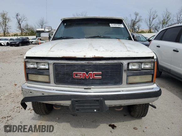 1989 GMC Sierra 1500 with VIN 2GTHC39K3K1532298, listed as a Copart auction lot 51497065 with 233,797 mi miles and Salvage Title. Bid and sale history available at DreamBid. Image 5.