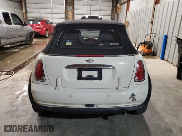 2007 MINI Convertible with VIN WMWRF33567TG17538, listed as a Copart auction lot 76506984 with 75,090 mi miles and Clean Title. Bid and sale history available at DreamBid. Image 6.