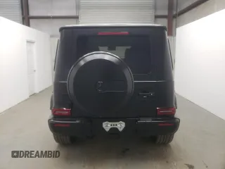 2022 Mercedes-Benz G 63 AMG with VIN W1NYC7HJ2NX444083, listed as a Copart auction lot 64764324 with 7,909 mi miles and Salvage title. Bid and sale history available at DreamBid. Image 6.