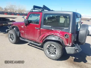 2013 Jeep Wrangler Sport with VIN 1C4AJWAG3DL608342, listed as a IAAI auction lot 41858662 with 118,504 mi miles and . Bid and sale history available at DreamBid. Image 3.