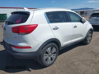 2014 Kia Sportage EX with VIN KNDPCCACXE7618991, listed as a IAAI auction lot 42413938 with 204,494 mi miles and . Bid and sale history available at DreamBid. Image 4.