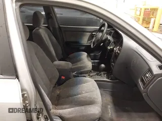 2002 Hyundai Elantra GLS z VIN KMHDN45D12U428589, wystawiony jako IAAI lot #42135566 z przebiegiem 133 479 mil mil oraz . Historia ofert i sprzedaży dostępna na DreamBid. Obrazek 5.