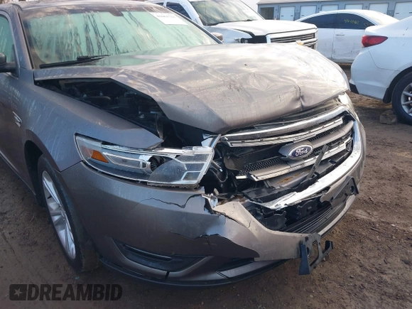2013 Ford Taurus SEL z VIN 1FAHP2E84DG193376, wystawiony jako IAAI lot #41661721 z przebiegiem 136 341 mil mil oraz . Historia ofert i sprzedaży dostępna na DreamBid. Obrazek 6.