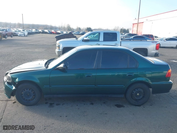 1999 Honda Civic VP with VIN 2HGEJ6617XH508270, listed as a IAAI auction lot 41319879 with 119,549 mi miles. Bid and sale history available at carsss.com. Image 14.