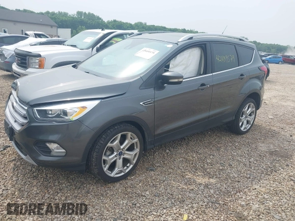 2019 Ford Escape Titanium with VIN 1FMCU0J97KUA34281, listed as a IAAI auction lot 42409579 with 55,400 mi miles and . Bid and sale history available at DreamBid. Image 18.