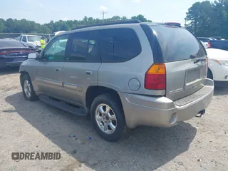 2003 GMC Envoy SLE z VIN 1GKDT13S632213799, wystawiony jako IAAI lot #42470437 z przebiegiem 289 728 mil mil oraz . Historia ofert i sprzedaży dostępna na DreamBid. Obrazek 3.