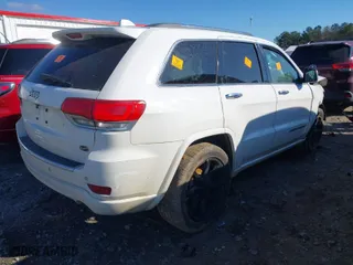 2017 Jeep Grand Cherokee Overland with VIN 1C4RJECG0HC636342, listed as a IAAI auction lot 41139209 with 145,760 mi miles. Bid and sale history available at carsss.com. Image 4.