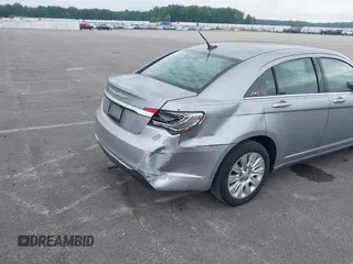 2013 Chrysler 200 LX with VIN 1C3CCBABXDN640536, listed as a IAAI auction lot 39425402 with 188,960 mi miles. Bid and sale history available at carsss.com. Image 13.