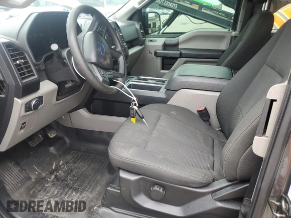2019 Ford F-150 XL with VIN 1FTEX1EP9KKC47098, listed as a Copart auction lot 60653275 with 104,823 mi miles and Salvage title. Bid and sale history available at DreamBid. Image 7.