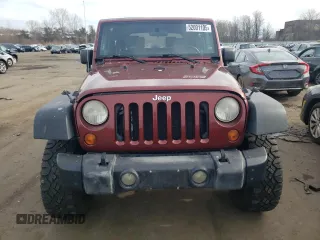 2007 Jeep Wrangler X with VIN 1J4FA24147L160102, listed as a Copart auction lot 52001105 with 219,939 mi miles and Clean Title. Bid and sale history available at carsss.com. Image 5.