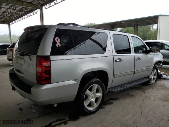 2013 Chevrolet Suburban LT with VIN 1GNSKJE76DR123518, listed as a Copart auction lot 66334144 with 270,402 mi miles and Salvage Title. Bid and sale history available at carsss.com. Image 3.