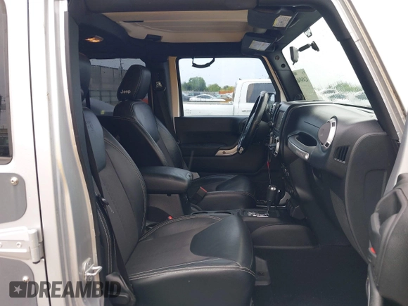 2012 Jeep Wrangler Unlimited Call of Duty MW3 with VIN 1C4BJWFG7CL281844, listed as a IAAI auction lot 42494946 with 93,669 mi miles and . Bid and sale history available at DreamBid. Image 5.