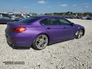 2013 BMW 6 Series 640i with VIN WBA6A0C58DDZ03250, listed as a Copart auction lot 52081974 with 146,345 mi miles and Salvage Title. Bid and sale history available at DreamBid. Image 3.