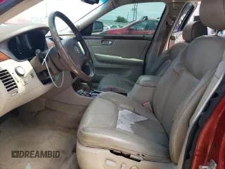 2006 Cadillac DTS 1SC z VIN 1G6KD57Y86U126357, wystawiony jako Copart lot #55745465 z przebiegiem 118 200 mil mil oraz Szkoda całkowita • Salvage title. Historia ofert i sprzedaży dostępna na DreamBid. Obrazek 7.
