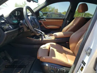 2015 BMW X4 xDrive28i with VIN 5UXXW3C53F0F89089, listed as a Copart auction lot 65869723 with 79,072 mi miles. Bid and sale history available at carsss.com. Image 7.
