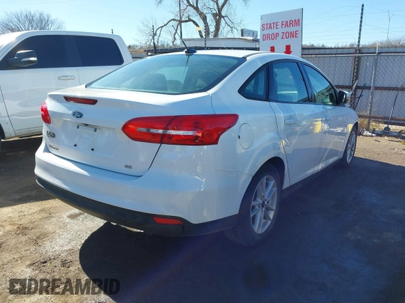 2017 Ford Focus SE with VIN 1FADP3F20HL347495, listed as a IAAI auction lot 41456890 with 94,679 mi miles. Bid and sale history available at carsss.com. Image 4.