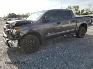 2020 Toyota Tundra SR5 with VIN 5TFEY5F12LX264876, listed as a Copart auction lot 61735495 with 63,470 mi miles and Salvage title. Bid and sale history available at DreamBid. Image 1.