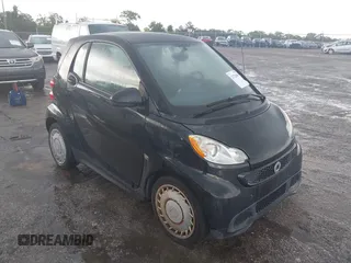 2013 Smart fortwo Pure with VIN WMEEJ3BA3DK682782, listed as a IAAI auction lot 42728005 with Not provided miles and . Bid and sale history available at DreamBid. Image 1.