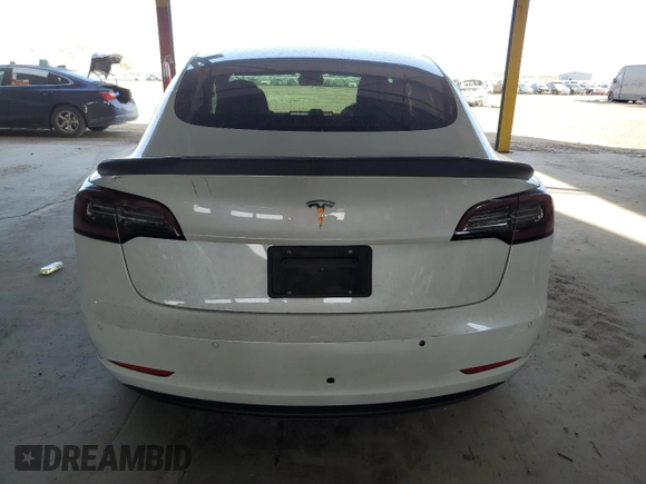2020 Tesla Model 3 Standard Range Plus with VIN 5YJ3E1EA6LF645215, listed as a Copart auction lot 47882375 with 69,317 mi miles and Salvage Title. Bid and sale history available at DreamBid. Image 6.