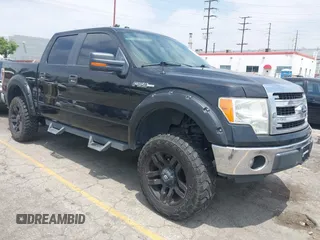 2013 Ford F-150 XL with VIN 1FTFW1CFXDKD26400, listed as a IAAI auction lot 42435316 with 157,699 mi miles and . Bid and sale history available at DreamBid. Image 1.