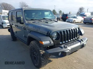 2022 Jeep Wrangler Unlimited Sport with VIN 1C4HJXDN7NW156538, listed as a IAAI auction lot 41526074 with 27,082 mi miles and . Bid and sale history available at DreamBid. Image 1.