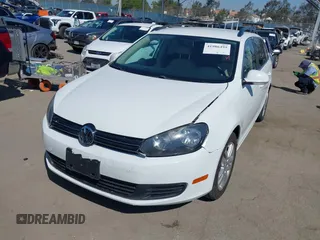 2014 Volkswagen Jetta SportWagen TDI w/Sunroof & Nav with VIN 3VWPL7AJXEM608549, listed as a IAAI auction lot 41986495 with 150,261 mi miles. Bid and sale history available at carsss.com. Image 2.