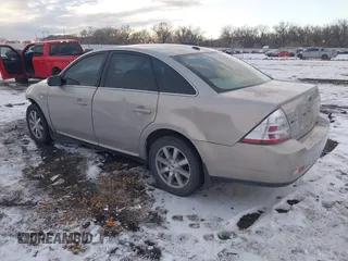 2009 Ford Taurus SEL with VIN 1FAHP27W89G121776, listed as a IAAI auction lot 40854998 with 150,022 mi miles. Bid and sale history available at carsss.com. Image 3.