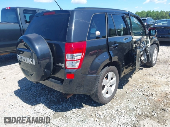 2009 Suzuki Grand Vitara z VIN JS3TE047094100192, wystawiony jako IAAI lot #42336959 z przebiegiem 244 995 mil mil oraz . Historia ofert i sprzedaży dostępna na DreamBid. Obrazek 4.
