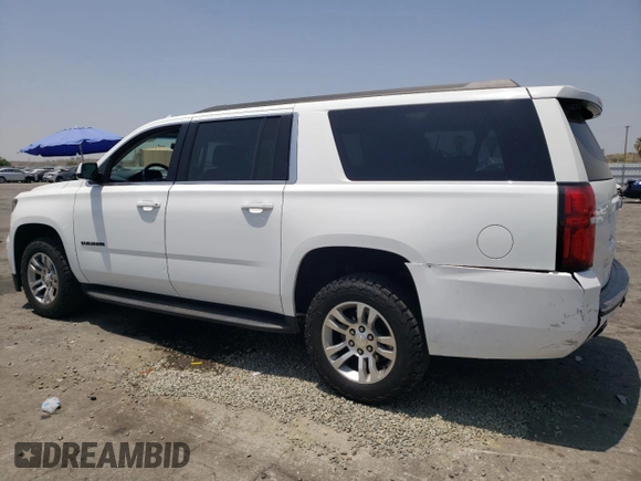 2019 Chevrolet Suburban LT with VIN 1GNSCHKCXKR207233, listed as a Copart auction lot 55410464 with 107,500 mi miles and Salvage Title. Bid and sale history available at DreamBid. Image 2.